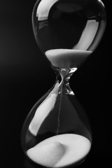 Hourglass on dark background