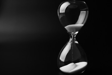 Hourglass on dark background