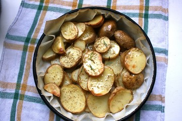 Baked potatoes in a baking sheet