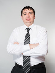 Portrait of young happy smiling business man