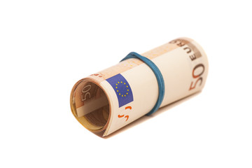Roll of one Fifty euro banknotes with a rubber band, isolated on