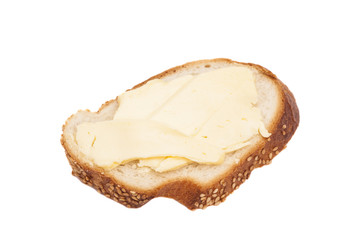 Sliced bread with butter isolated on white