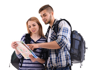 Pair of travelers with map isolated on white