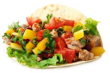 Homemade beef burrito with vegetables and tortilla, isolated on white