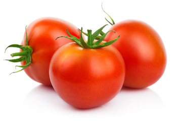 Red tomatoes with cut isolated on white