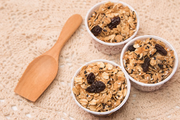 Granola in cupcake cases  on white background