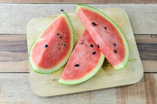 Slice Fresh Watermelon on wood background