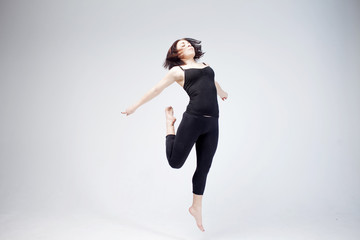 athletic girl posing in Studio, place for your text on the right