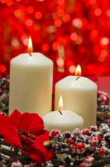 White candles in autumn winter decoration
