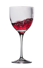 wine is poured into a glass on a white background