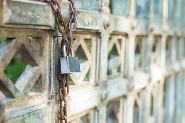Lock on a chain link security fence.