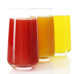 Glasses of different juice isolated on white