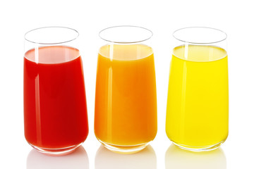 Glasses of different juice isolated on white