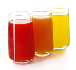 Glasses of different juice isolated on white
