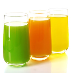 Glasses of different juice isolated on white