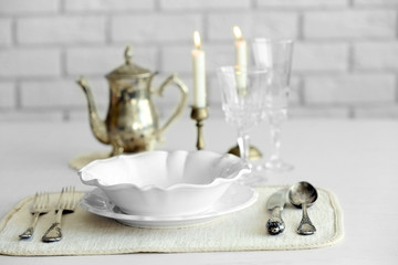 Beautiful table setting with vintage silverware