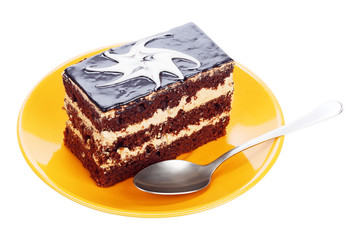 Chocolate cake on orange plate