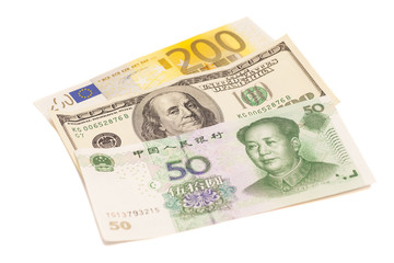 American dollars, European euro and Chinese yuan bills