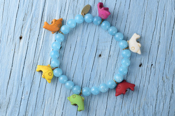 Bracelet on old wooden table