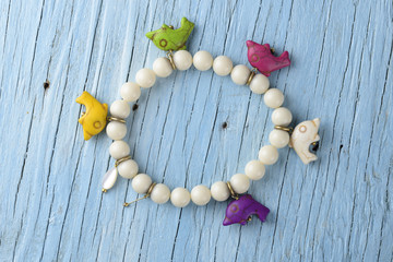 Bracelet on old wooden table