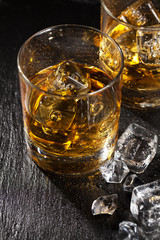 Glasses of scotch whiskey with ice