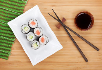 Fototapeta na wymiar Sushi set, chopsticks and soy sauce