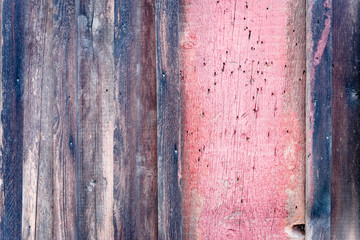 Wooden texture of brown color with scratches and cracks, which can be used as a background
