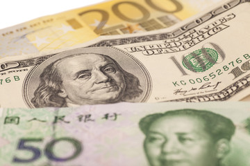 American dollars, European euro and Chinese yuan bills