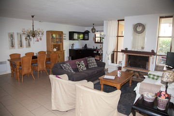 Modern, bright, clean, kitchen interior with stainless steel appliances in a luxury house