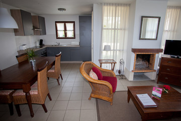 Modern, bright, clean, kitchen interior with stainless steel appliances in a luxury house