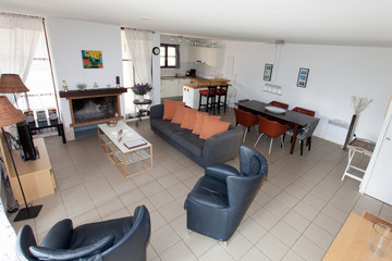 Modern, bright, clean, kitchen interior with stainless steel appliances in a luxury house