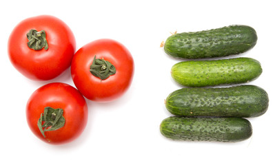 cucumbers and tomatoes on a white background