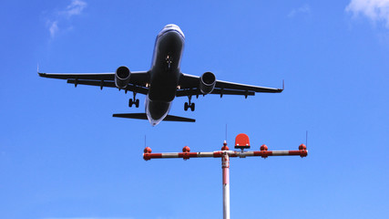 jetplane ready for landing wih signal lights