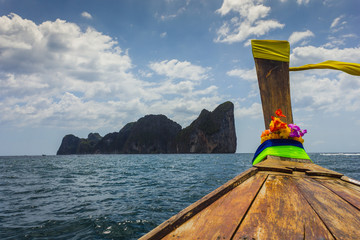 Boats at sea against the rocks in Thailand