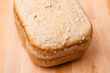 loaf of bread on wooden background