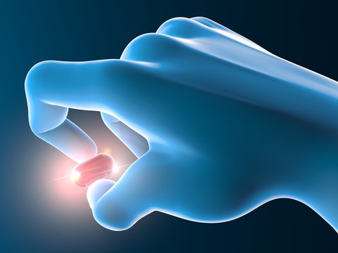 Persona che prende una pillola, pastiglia