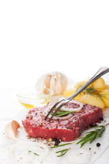 Raw beef steak and spices