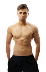 Fototapeta premium Muscle young man isolated on white