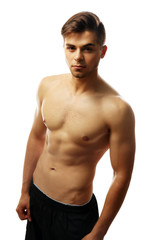 Fototapeta premium Muscle young man isolated on white