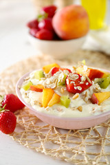 Healthy breakfast with homemade oatmeal, close up