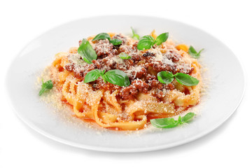 Pasta Bolognese with parmesan and basil isolated on white