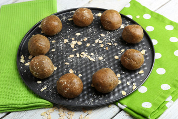 Raw dough for cookies on baking sheet close up