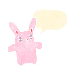 cartoon pink rabbit with speech bubble