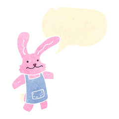 retro cartoon pink rabbit with speech bubble