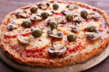 Tasty pizza with vegetables close up