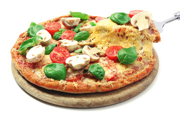 Tasty pizza with vegetables and basil isolated on white