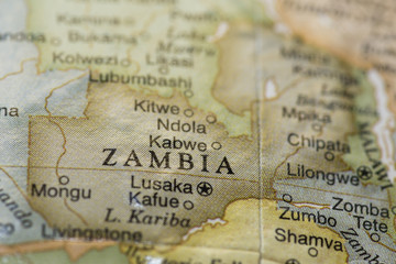 Macro of Zambia on a globe - obrazy, fototapety, plakaty