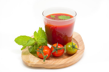 Fresh tomato juice isolated on white background
