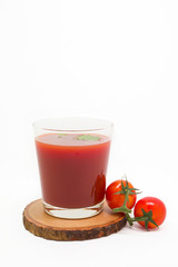 Fresh tomato juice isolated on white background