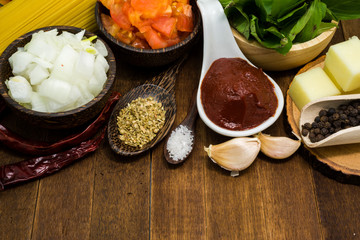 Raw spaghetti Ingredients on wooden table